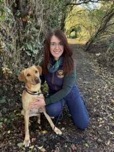 Kelly dog Trainer holding her labrador